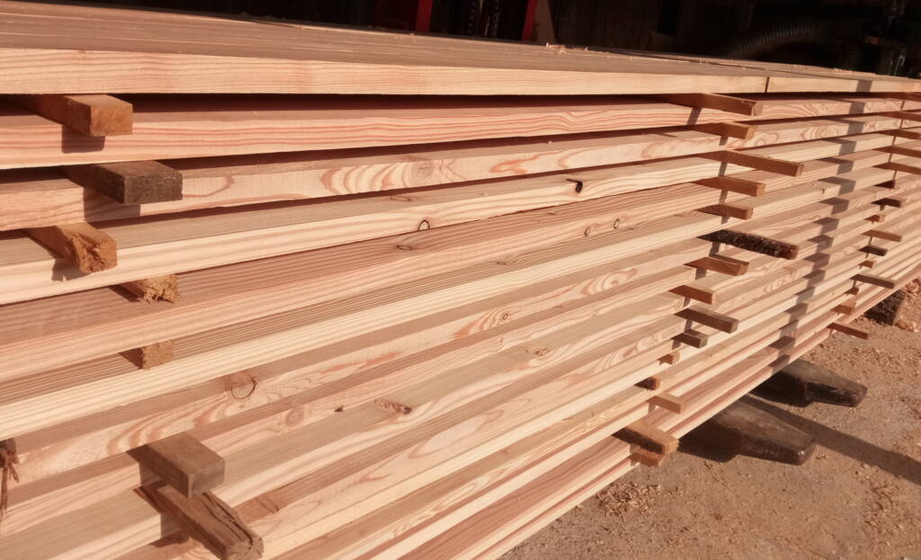 planed larch slats for facade cladding